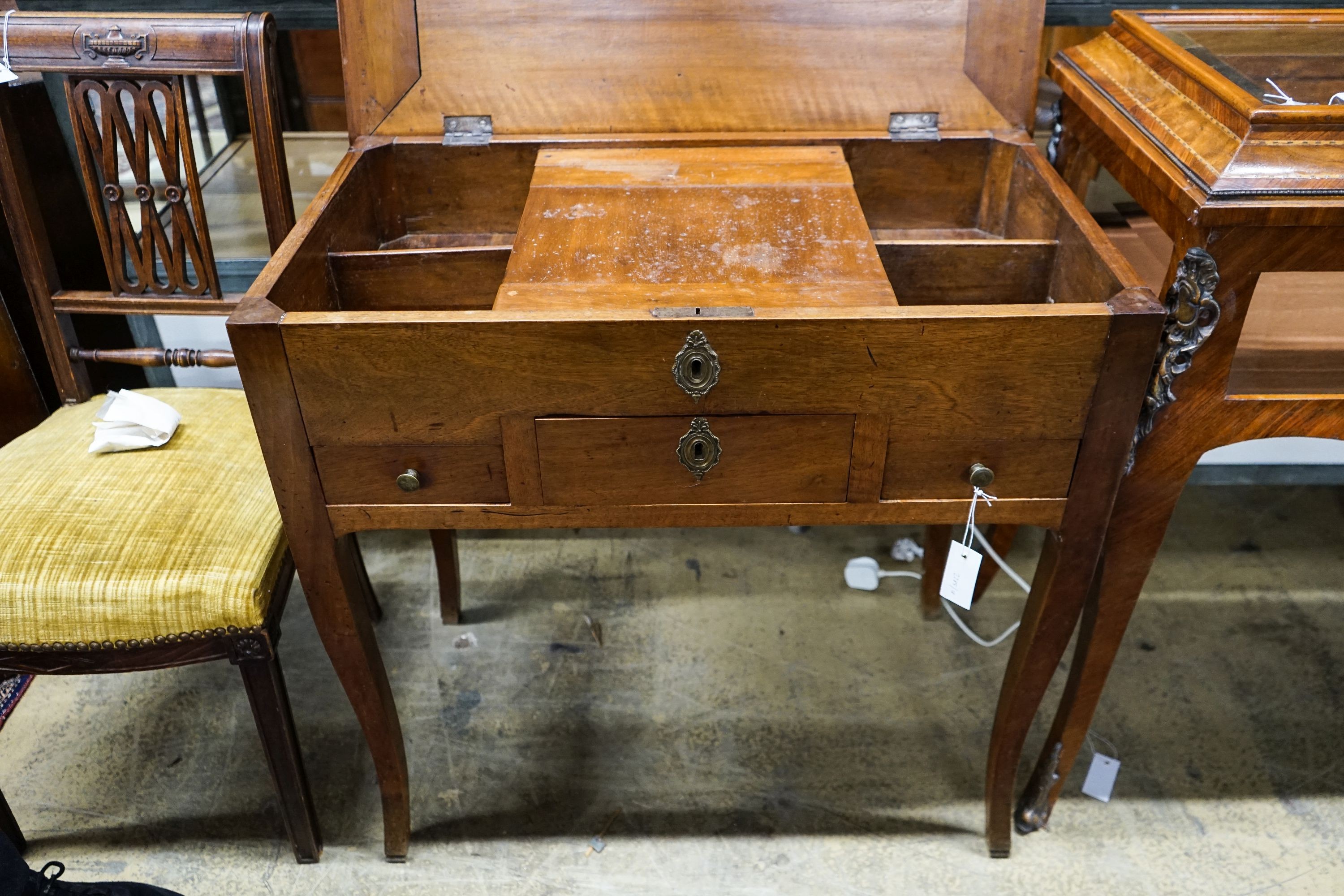 A 19th century French fruitwood enclosed dressing table with rectangular hinged top, width 78cm, depth 45cm, height 76cm